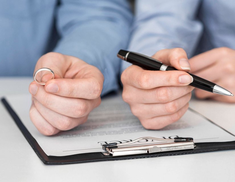 Client signing legal agreement