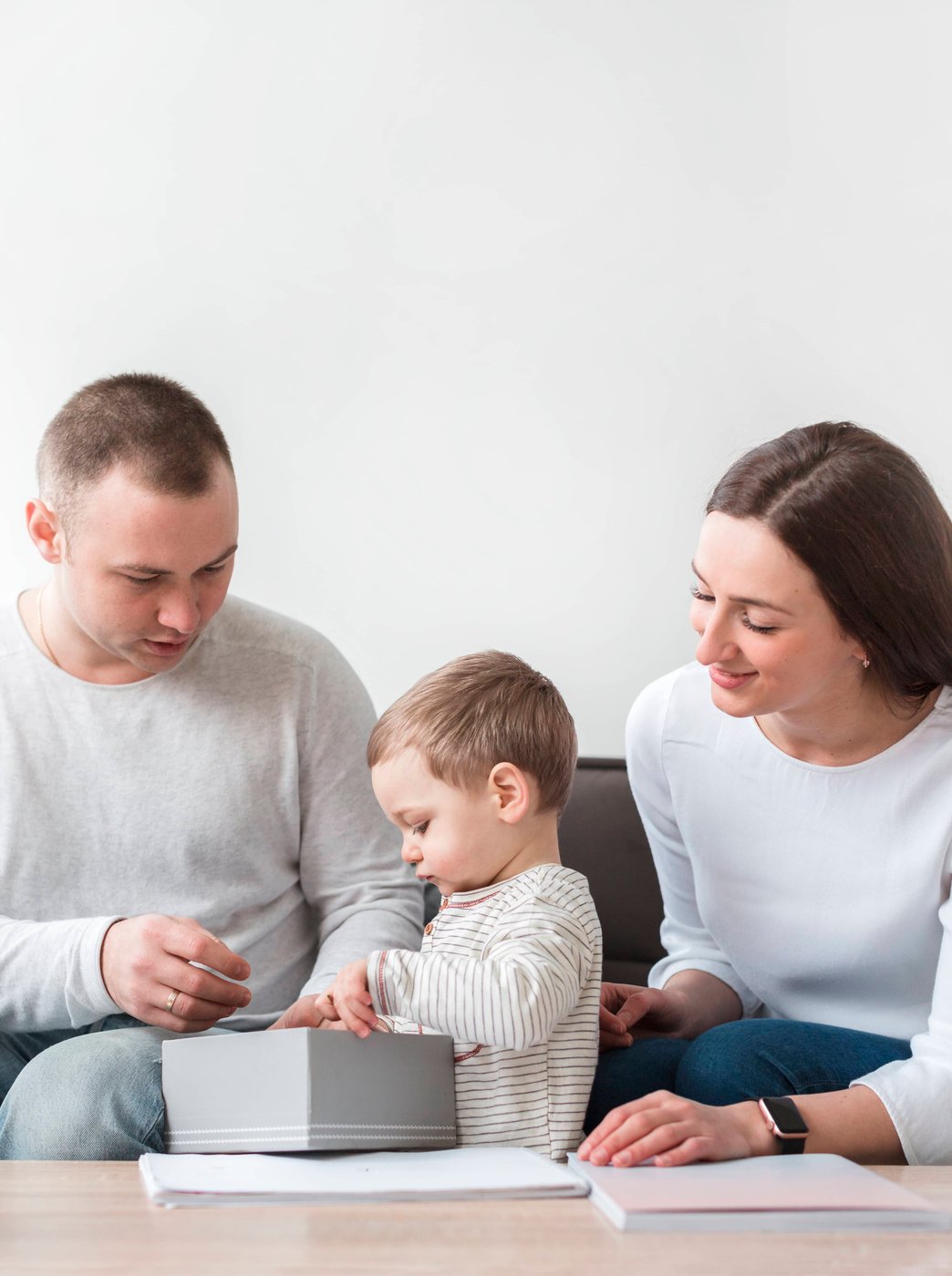 Parents supporting child during legal meeting