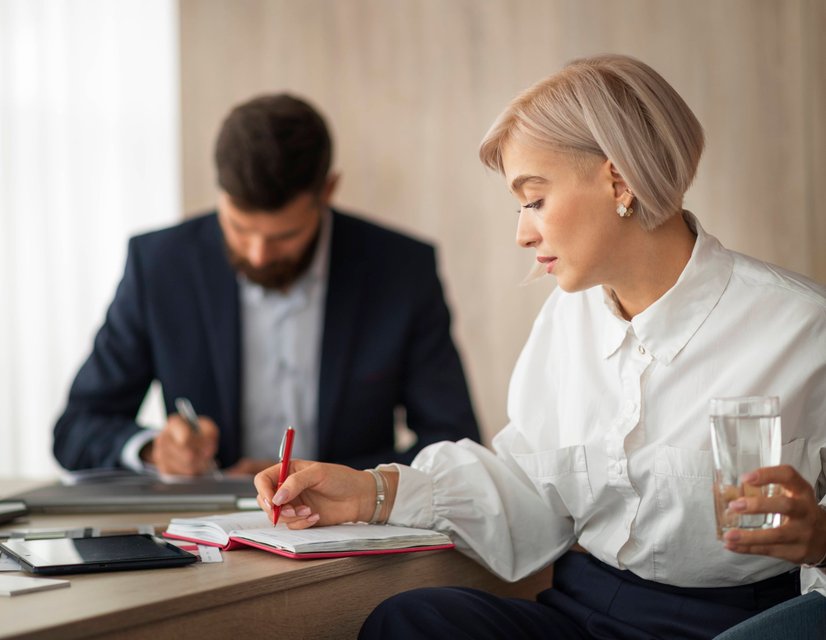 Attorney assisting client with legal paperwork